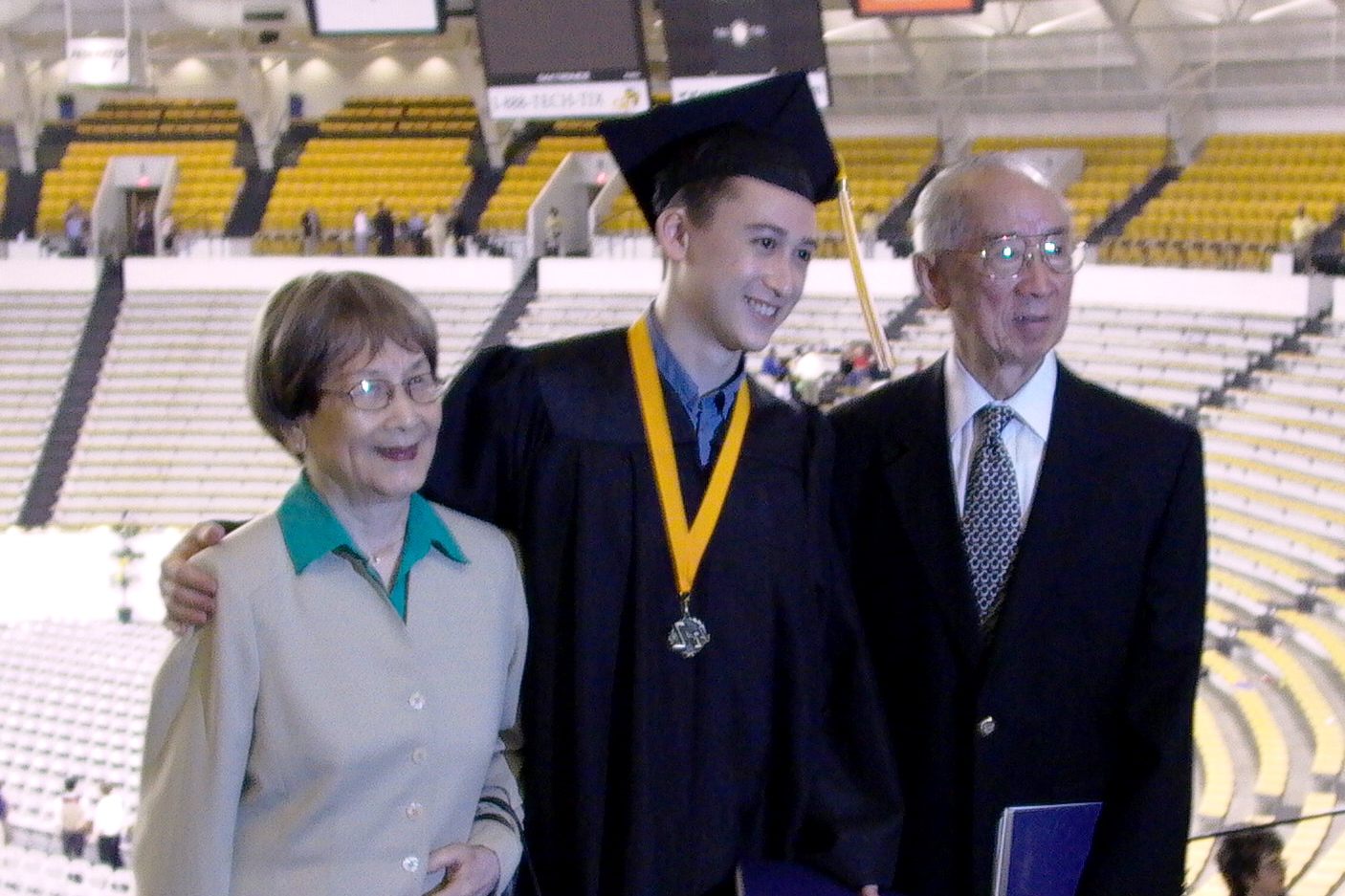 Graduation with my Grandparents